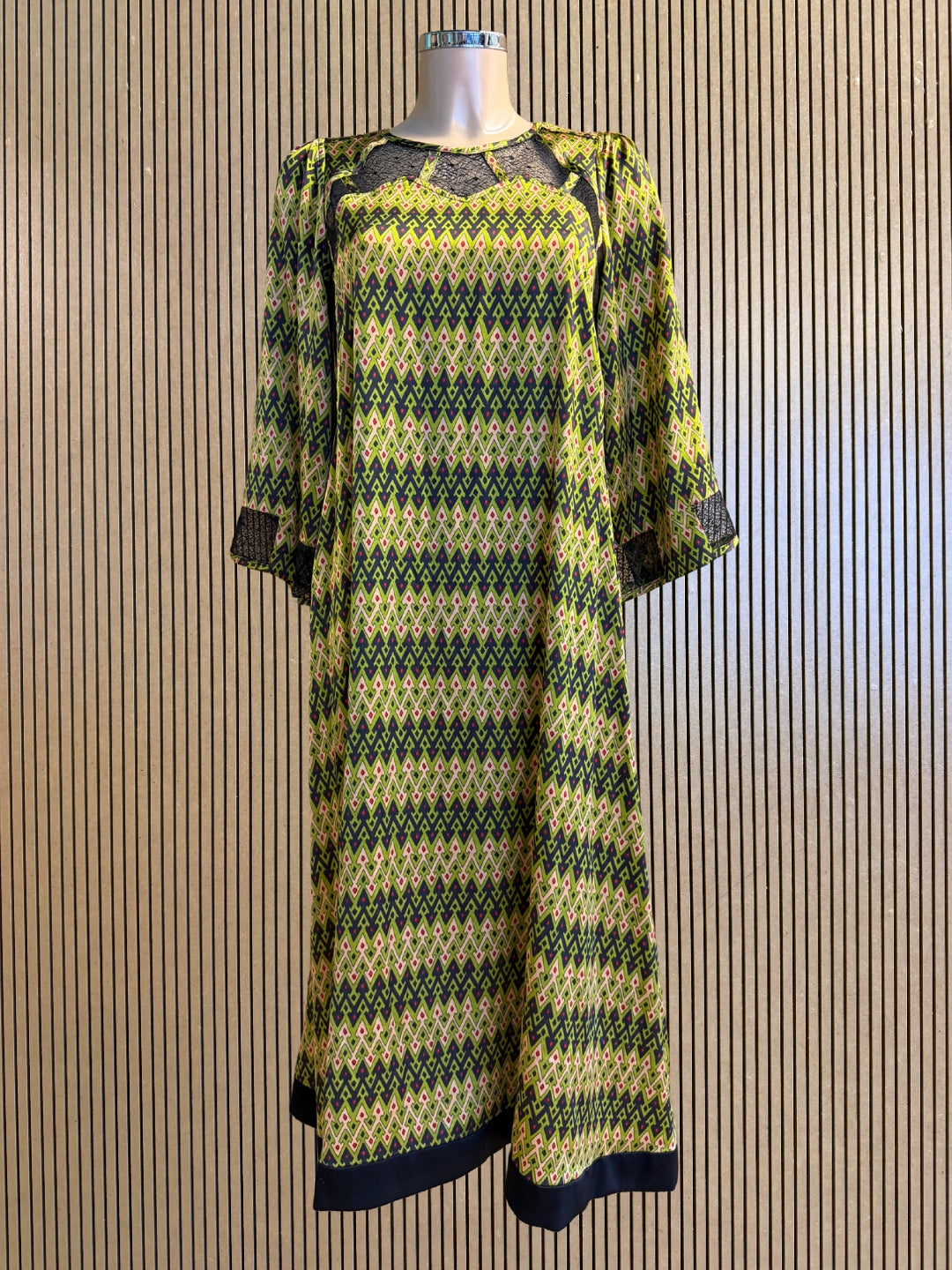 Front product view of Kron by Kronkron Jacqueline silk dress in Sporrof Green with semi-sheer upper panel
