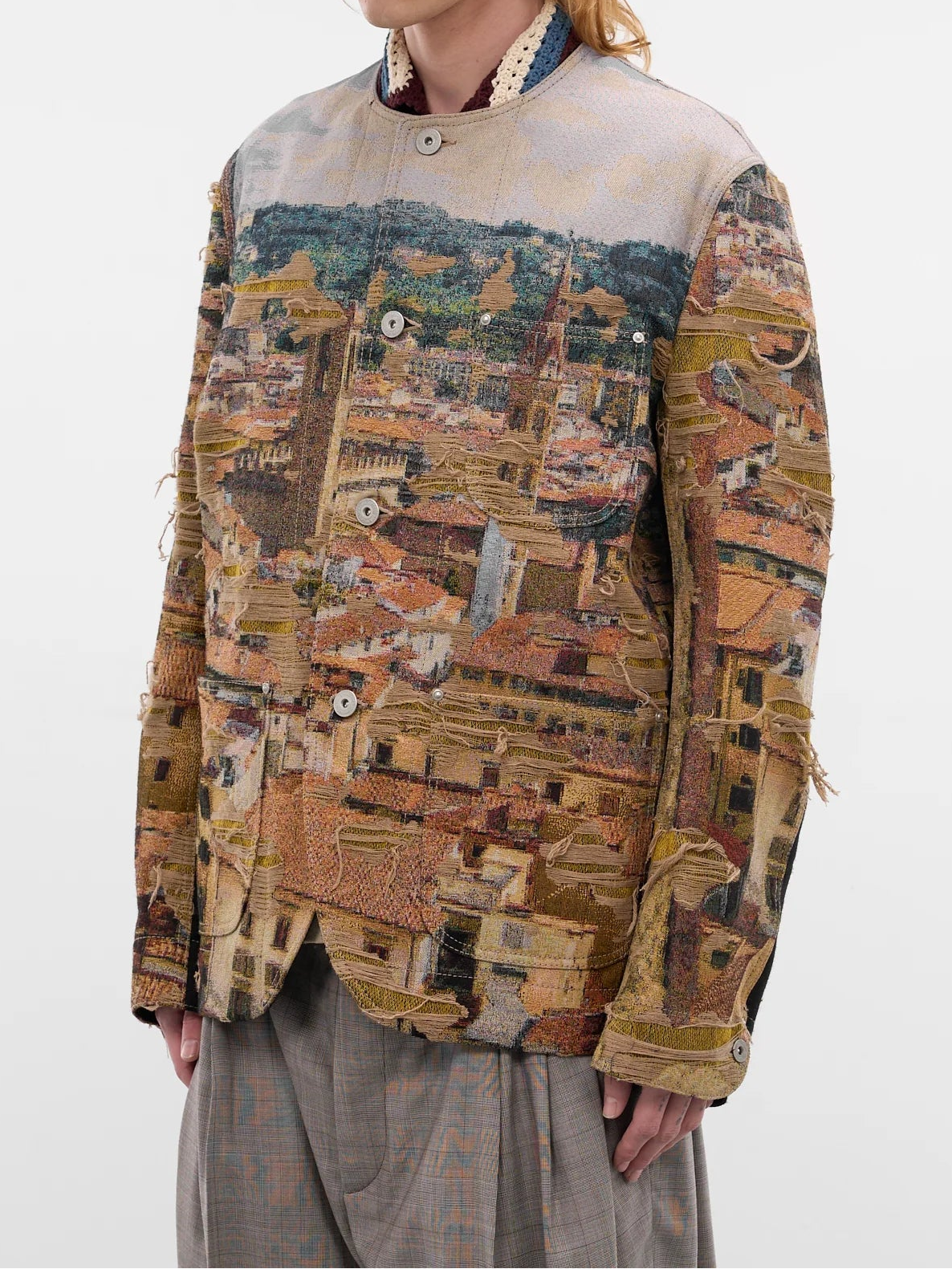 Three-quarter worn
Junya Watanabe Man Distressed Cityscape Knit Jacket in beige shown at an angle with tailored fit