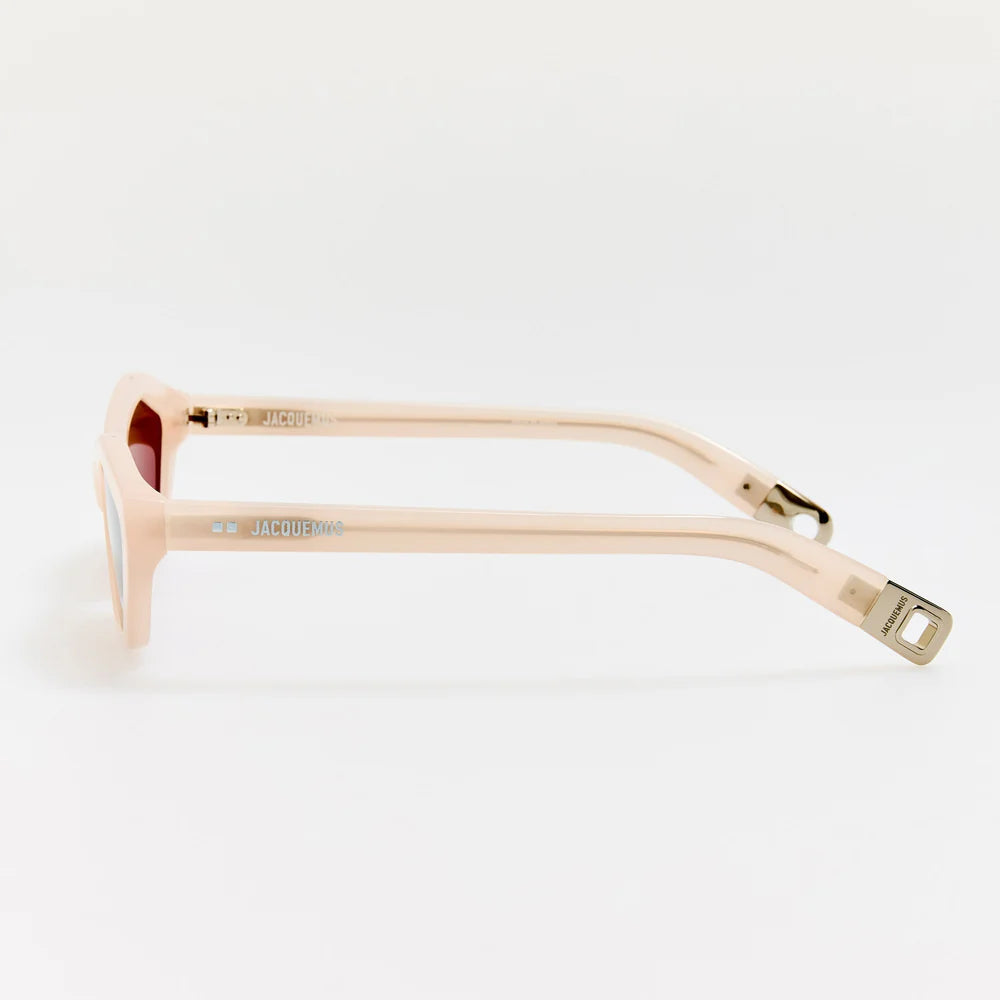 Side view of Jacquemus Bambino sunglasses showing pearl acetate temples and silver-tone details