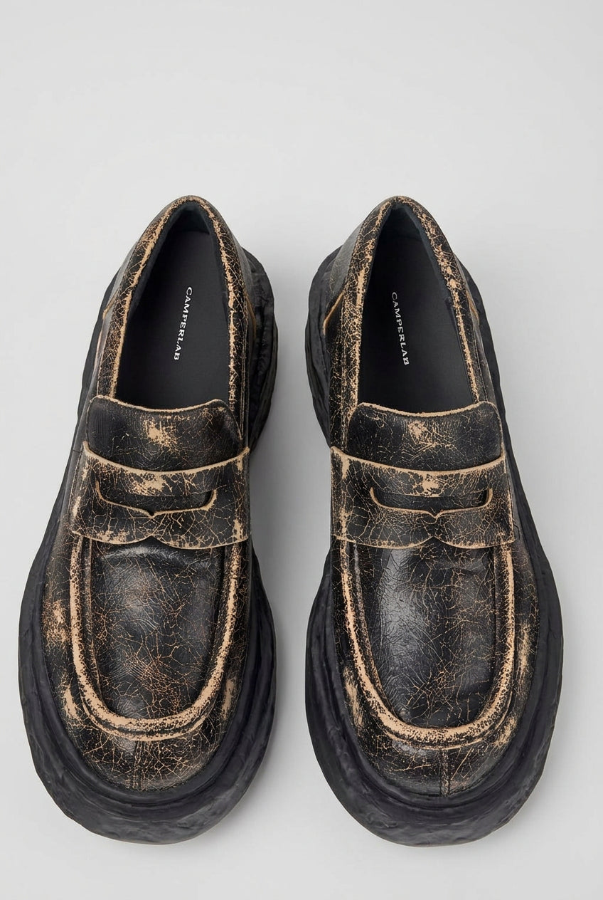 Top view of CamperLab Tormenta black and brown leather sneakers