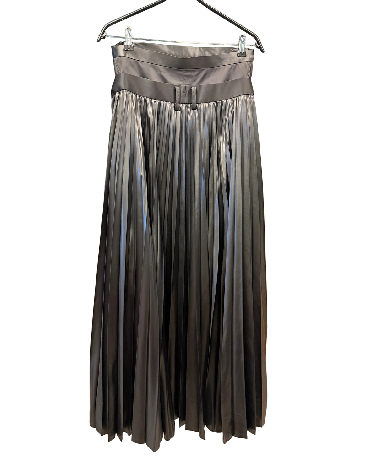 Back view of Junya Watanabe black trousers showing full pleated panels and fluid silhouette