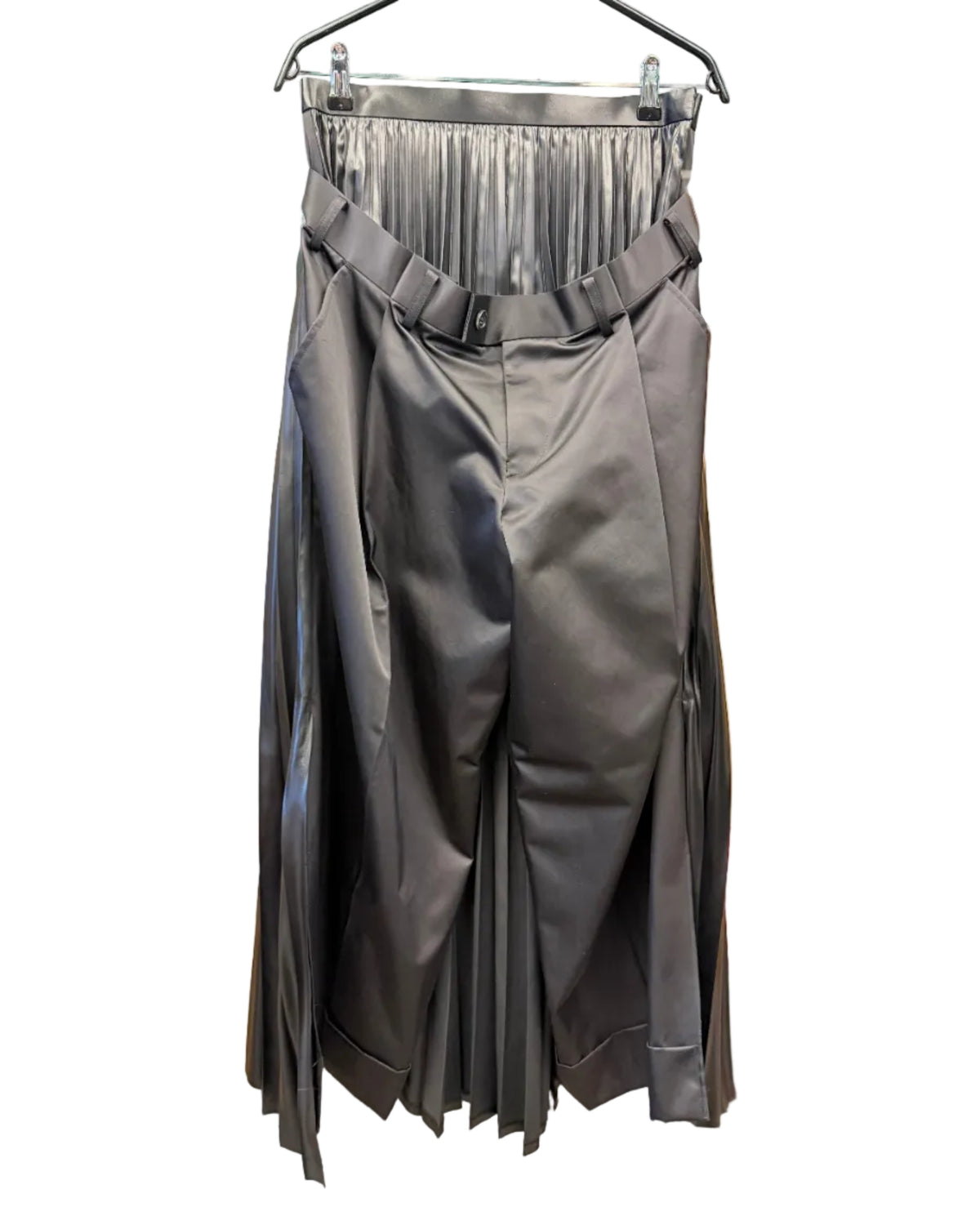 Front view of Junya Watanabe black pleated panel trousers with layered waistband and tailored front