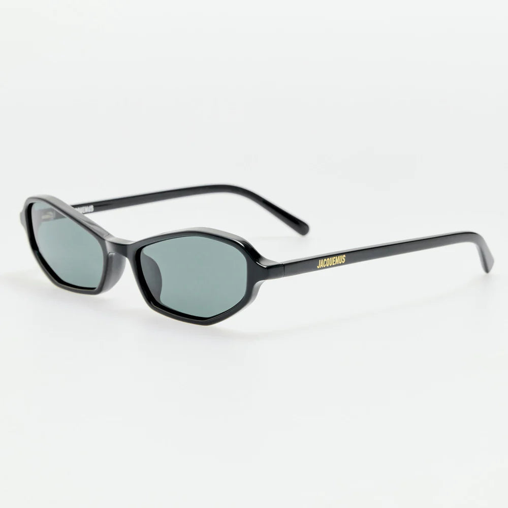 Angled view of Jacquemus Pina sunglasses in black acetate with grey lenses