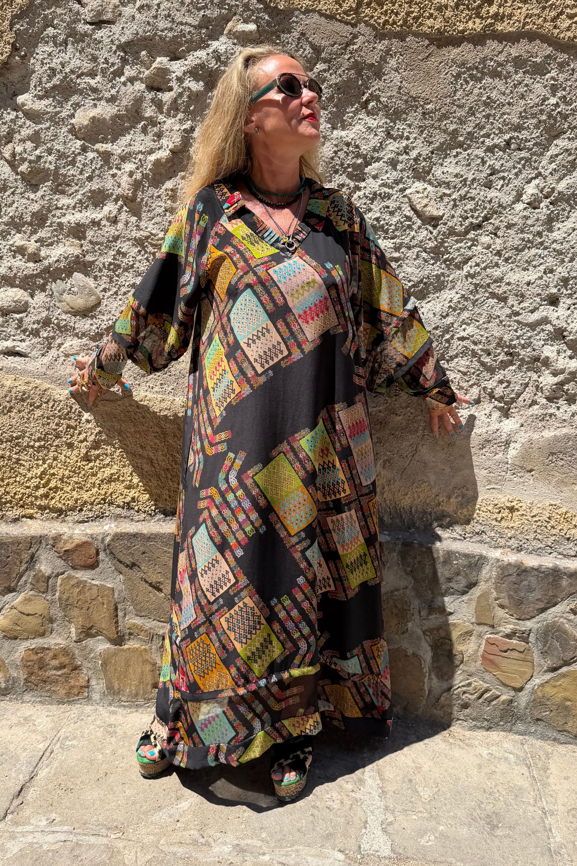 Three-quarter view of Andrilla silk dress in Harly Black by Kron by Kronkron
