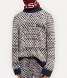 Distressed tartan jumper