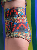 Kron by Kronkron Dita Highrise Bikini Bottom in Daggdís print worn as a high-rise bikini bottom