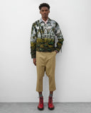 Full look
Junya Watanabe Man House Jacket in multi worn with cropped trousers and red lace-up boots