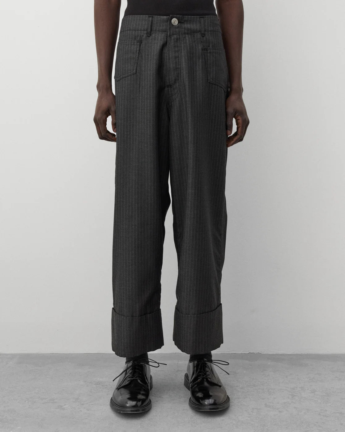 Front worn
Junya Watanabe Man Levi’s Pinstripe Trousers in grey with wide leg and cuffed hems, front view