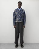 Full look
Junya Watanabe Man Levi’s Pinstripe Trousers in grey styled with a blue jacquard jacket and black leather shoes