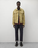 Full look
Junya Watanabe Man Striped Knit Polo in navy and orange styled with grey trousers and black leather shoes