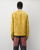 Back worn
Junya Watanabe Man Floral Pattern Jacket in yellow shown from the back with adjustable button tabs