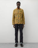 Worn full length
Junya Watanabe Man Plant Pot Tapestry Jacket in brown worn with dark denim and black shoes