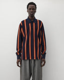 Front worn
Junya Watanabe Man Striped Knit Polo in navy and orange with long sleeves and polo collar