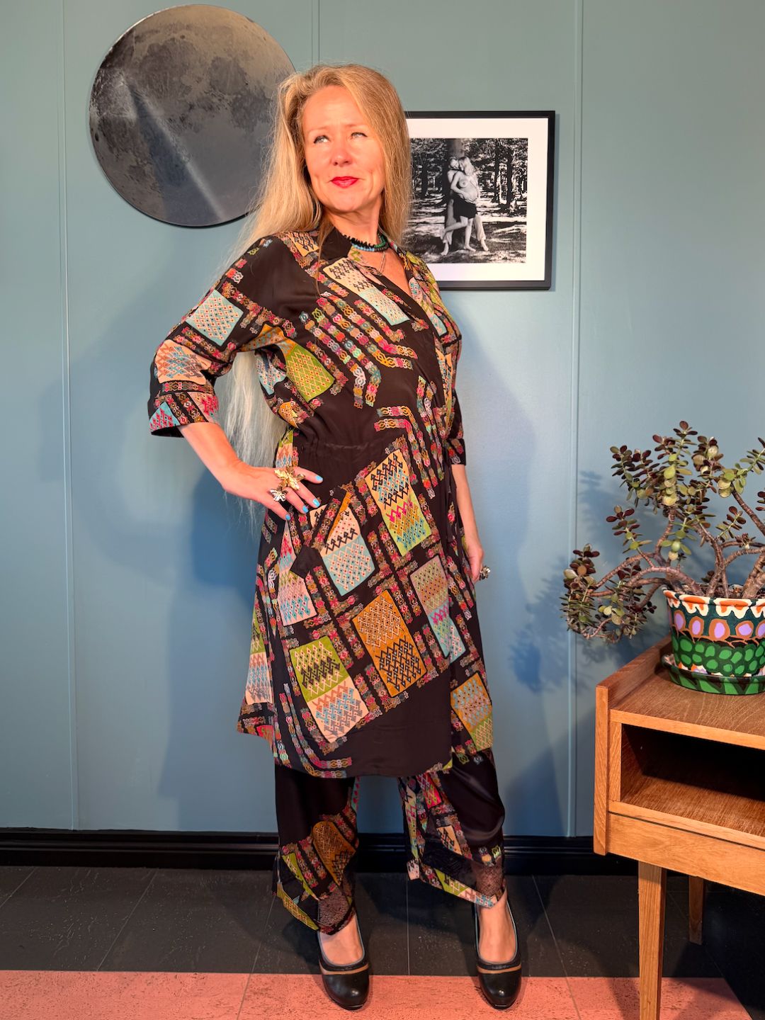 Rimini Black Harly silk dress showing crossover V-neckline, relaxed fit and concealed waist shaping