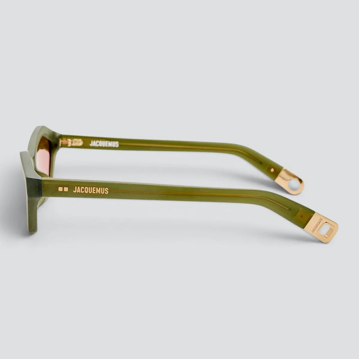 Side view of Jacquemus Bambino sunglasses showing acetate temples and gold logo detail