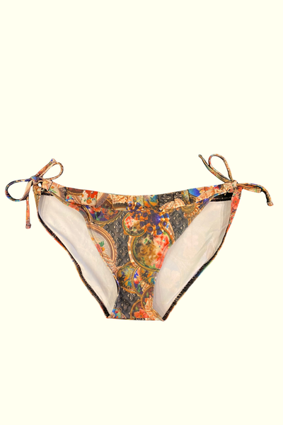 Kron by Kronkron Trixy Triangle Bikini Bottom in Treasurehunt print with adjustable side ties and pleated waist detail