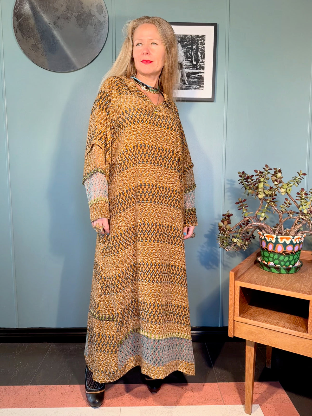 Andrilla Sporrof Brown & Blue silk dress showing the relaxed drape, full length and semi-sheer sleeve panels