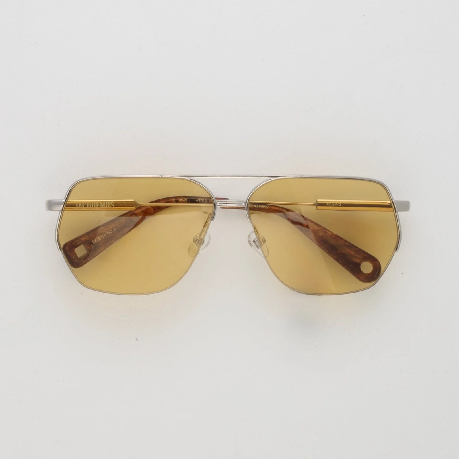 Jacquemus Aviador sunglasses in silver with yellow lenses, front view