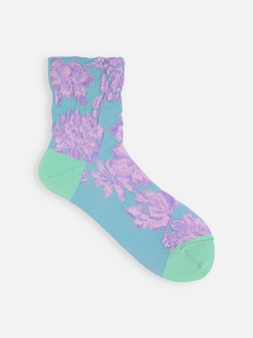 Tabio Float Flowers Low Crew Socks in mint with large lilac floral pattern and soft ankle-length shape