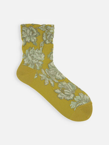 Tabio Float Flowers Low Crew Socks in curry with large pale green floral pattern and ankle-length shape