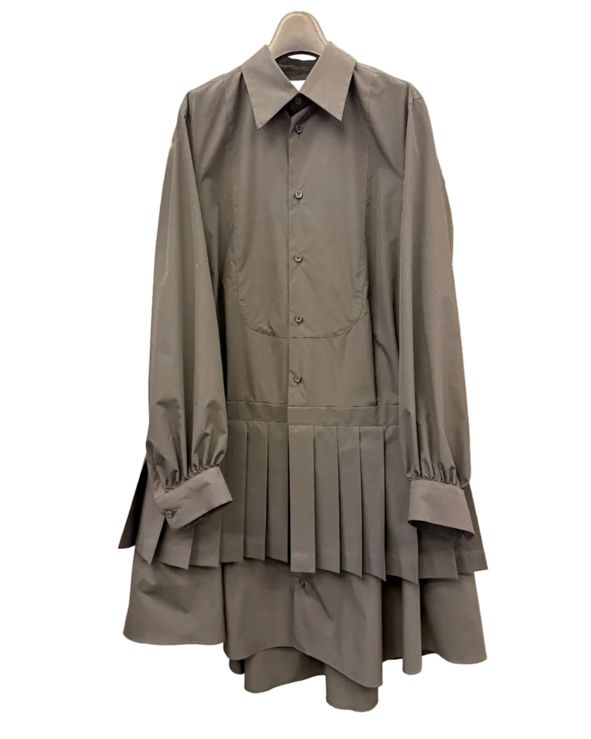 Front view of noir kei ninomiya black pleated shirt dress with pointed collar and button front
