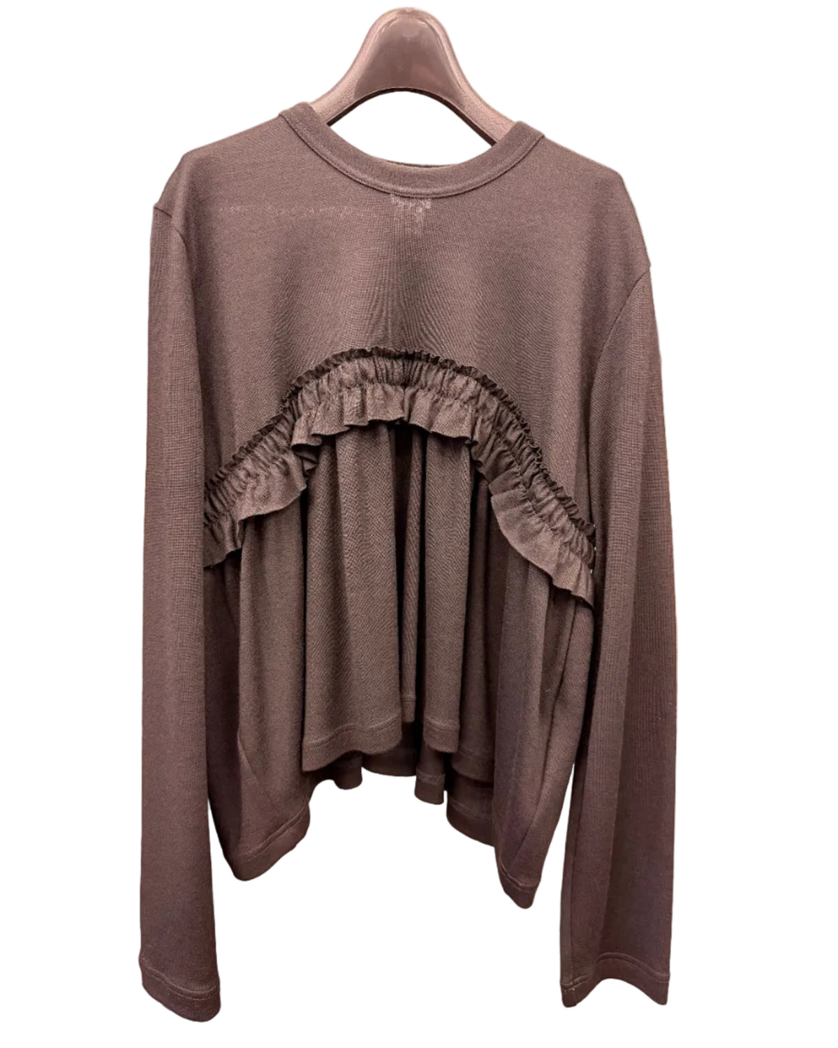 Front view of noir kei ninomiya black wool top with sculptural gathered ruffle panel