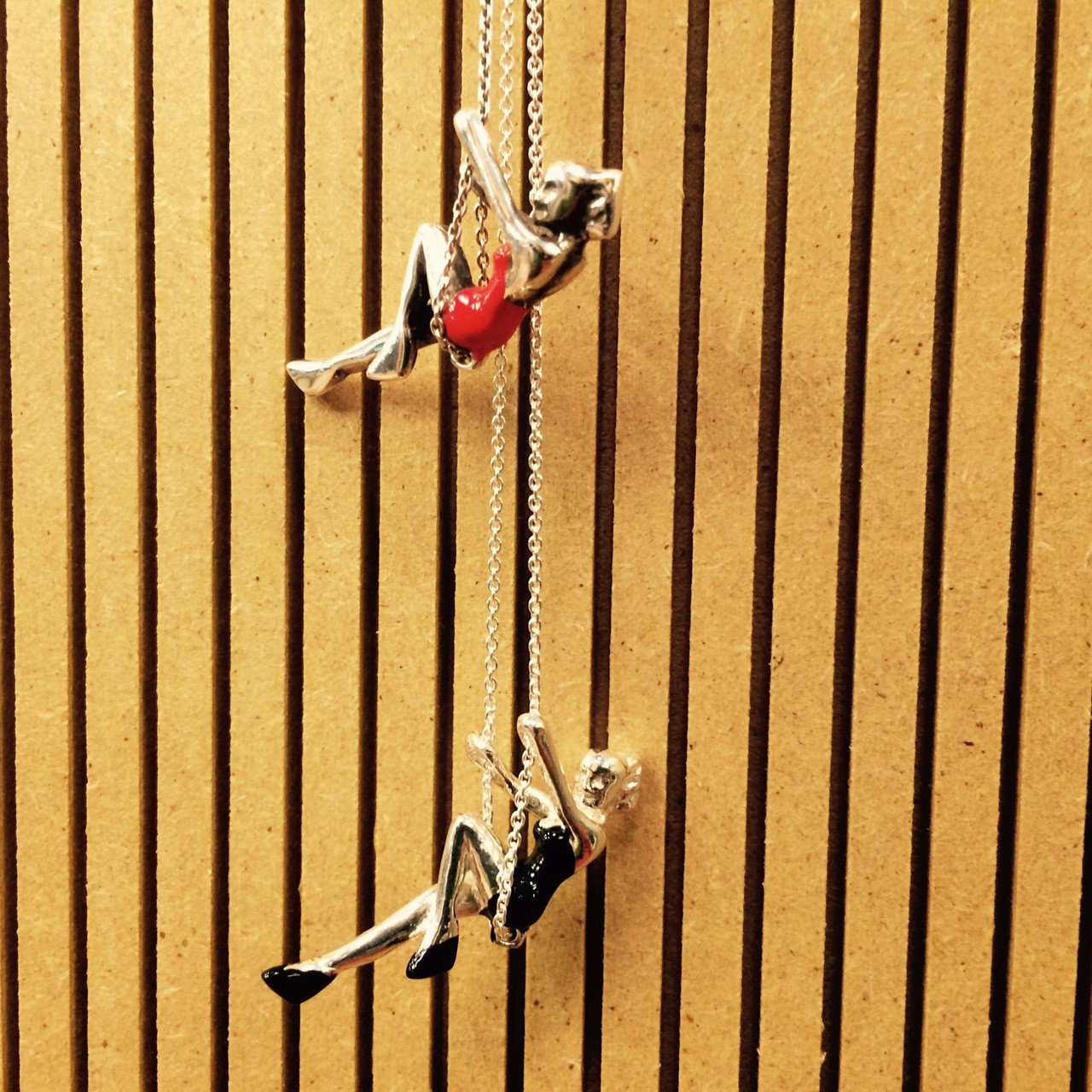 Swinging lady necklace